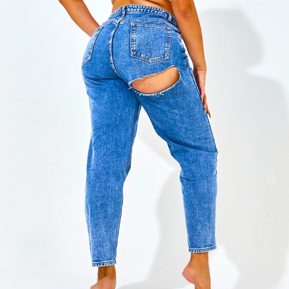 High waisted denim jeans and it has a rip behind by the butt area